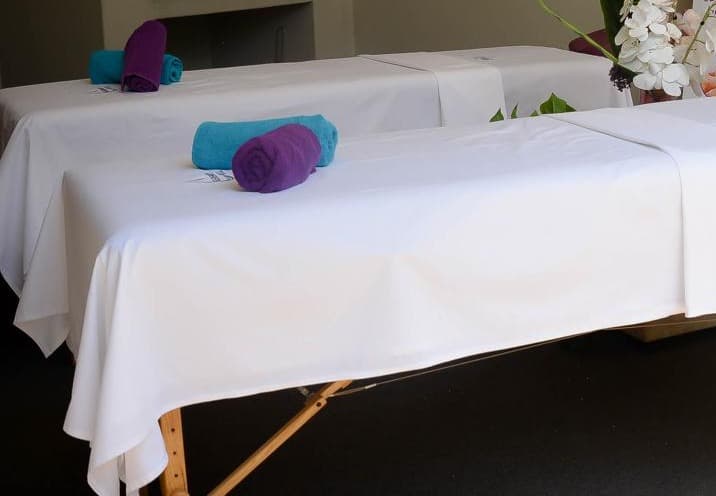 Serenity Well massage tables set up for a group event
