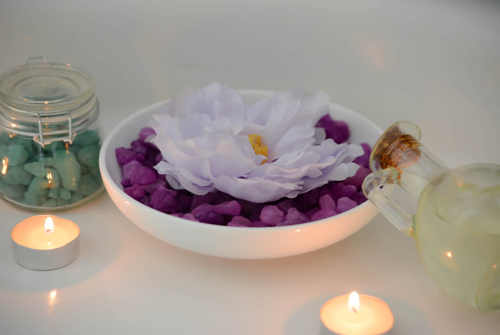 A Serenity Well spa ritual — candles, oils and stones